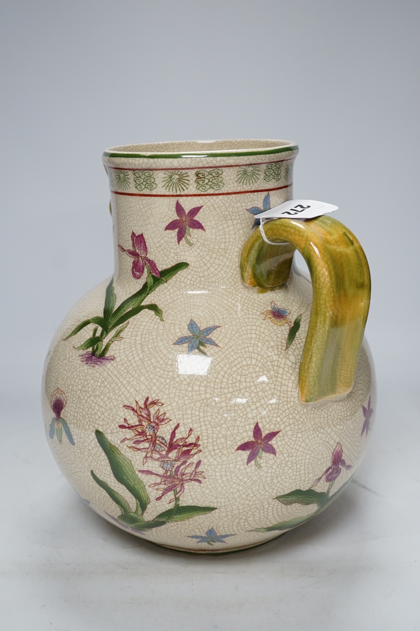From the Studio of Fred Cuming. A large crackle glaze pottery mask jug, 29cm high. Condition - good